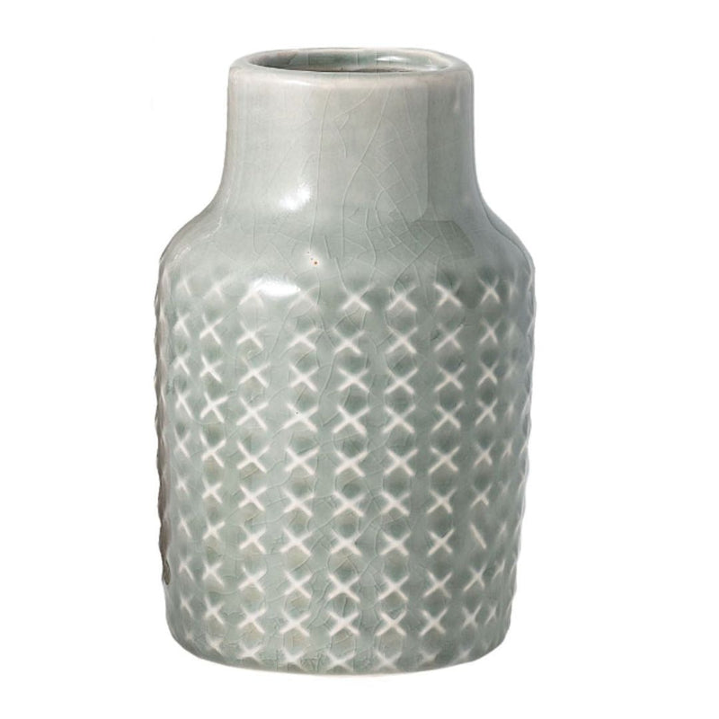 A small, 6x2 ceramic vase with a glossy, light gray finish. It features a slightly tapered neck and a textured crosshatch pattern covering its surface. This Ceramic Vase - Green by MyHomeDecor.ca boasts a simple, modern design suitable for home decor.