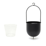 A MyHomeDecor.ca Metal Hanging Planter - Black with an arching handle and hook sits next to a clear, PVC hard liner that fits a 4″ pot. The design allows for easy planting and hanging. The black planter has a round, smooth surface, providing a minimalist and modern look.