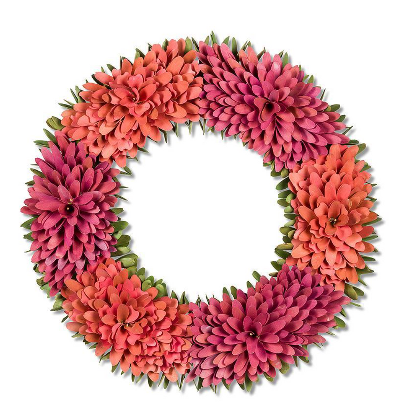 An Extra Large Ombre Wreath - Fushia by MyHomeDecor.ca, perfect as a door decoration, adorned with vibrant life-like blooms in shades of pink and orange. The flowers are arranged in a circular pattern, with green leaves interspersed between them. The center of the wreath is open.